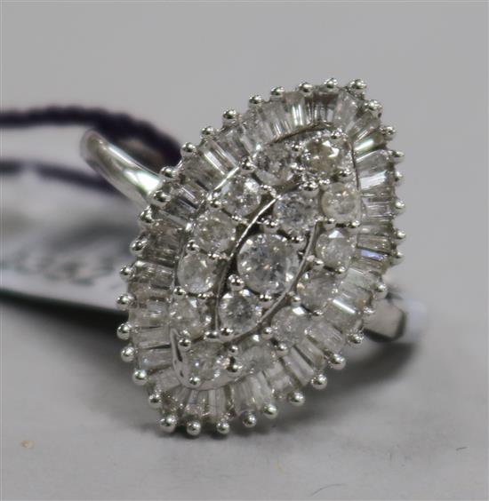 A diamond and 9ct white gold marquise cluster ring